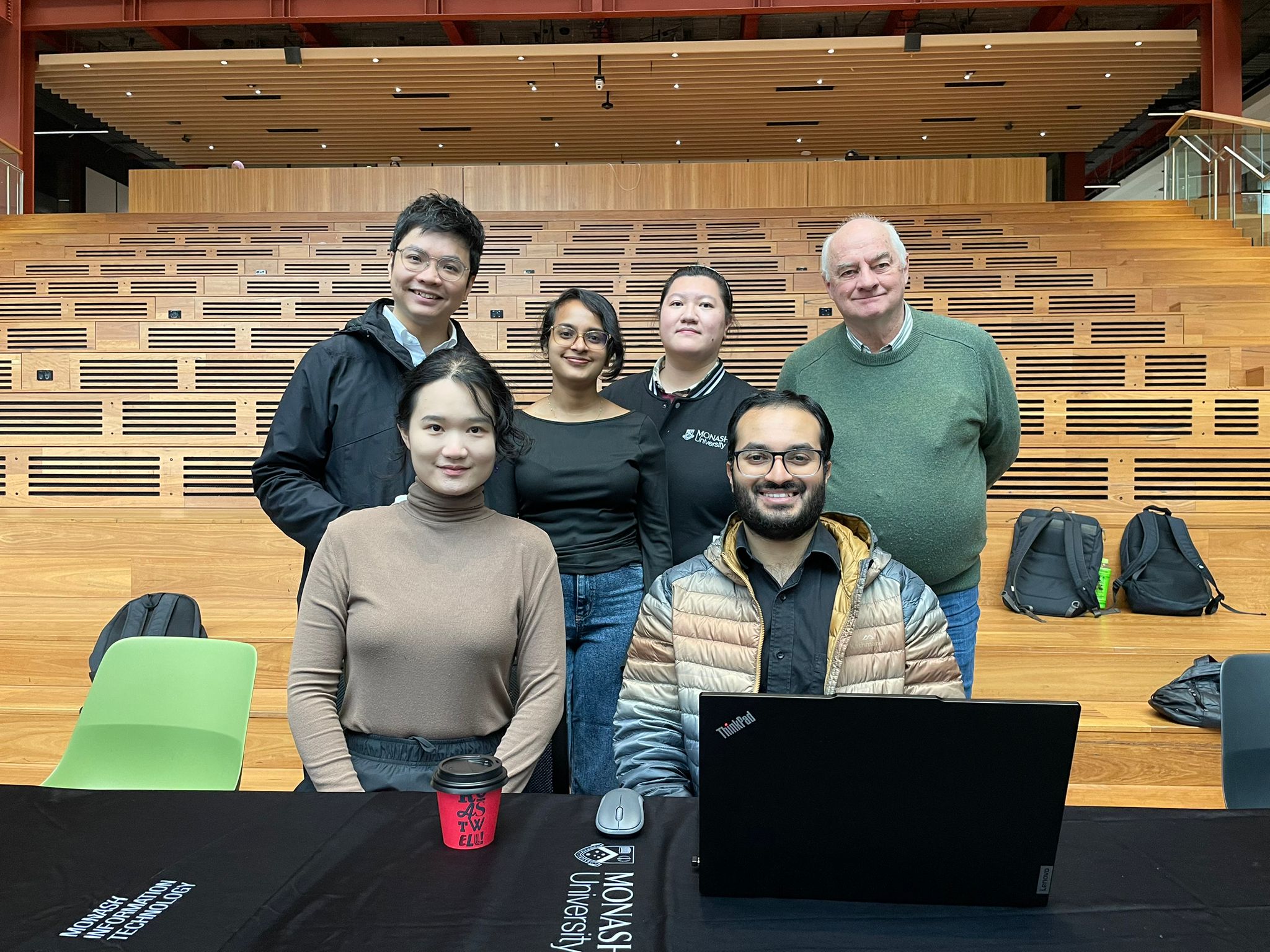 The Turing Lab team posing together at the Expo